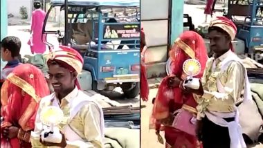 Viral Video: दुल्हन को गर्मी से बचाने के लिए दूल्हे ने निकाला गजब का जुगाड़, हाथ में लेकर चलने लगा पंखा