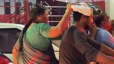 मां से बढ़कर कोई नहीं! खुद भीगकर बेटे को बारिश से बचाने की कोशिश करती दिखी महिला, देखें दिल छू लेने वाला Viral Video