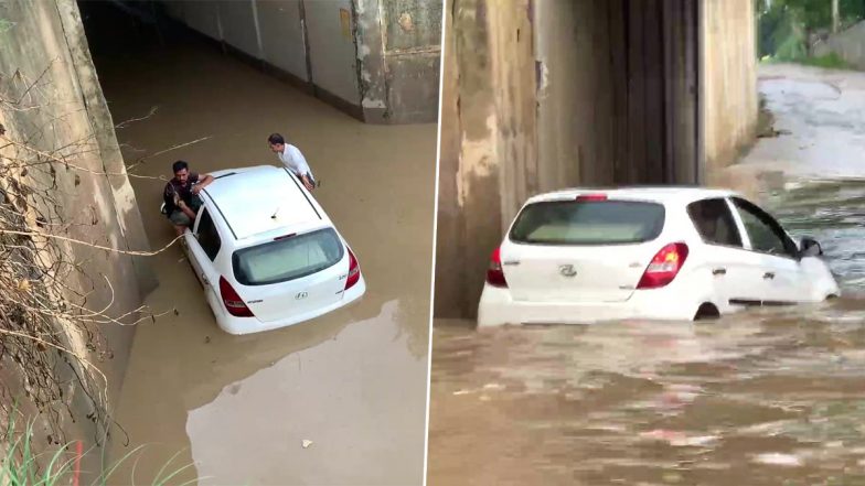 UP: हापुड़ के रेलवे अंडरपास में भरे पानी में एक कार फंसी, SDM ने कहा- नाली नहीं बनने के कारण होता हैं