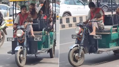 Viral Video: बच्चे को गोद में लेकर ई-रिक्शा चलाने वाली महिला का वीडियो वायरल, लोगों ने किया मां के जज्बे को सलाम