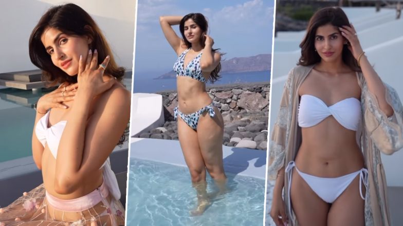 Sakshi Malik ने व्हाइट बिकनी पहन स्विमिंग पूल में लगाई आग, Bom Diggy Diggy गर्ल की हॉटनेस ने यूजर्स का हाल किया बेहाल (Watch Video)