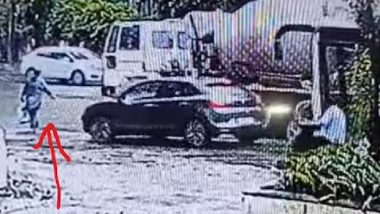 Pune Accident Video: चमत्कार! ट्रक की चपेट में आने के बाद भी बच गई महिला, हादसे का वीडियो वायरल