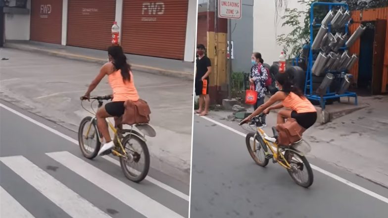 Video: साइकिल चलाते समय महिला ने अपने सिर पर बोतल किया बैलेंस, देखें वीडियो