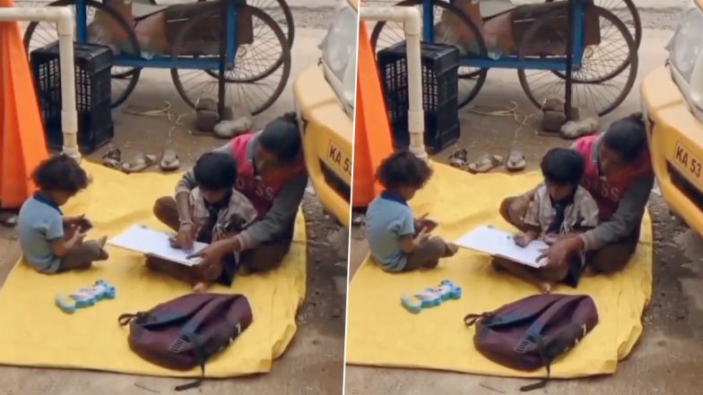 जज्बे को सलाम! फल बेचने के साथ ही सड़क के किनारे अपने बच्चों को पढ़ाती दिखी महिला, देखें दिल जीतने वाला Viral Video
