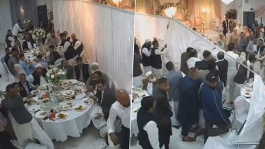 Viral Video: शादी में जुटे मेहमानों के बीच हुई भयंकर बहसबाजी, एक-दूसरे पर जमकर चलाए डंडे और लात-घूसे