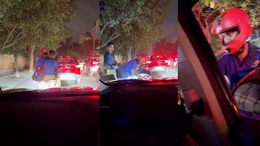 Viral Video: बैंगलोर के ट्रैफिक जाम में फंसे कस्टमर ने ऑर्डर किया पिज्जा, LIVE लोकेशन से सीधे कार में हुई डिलवरी