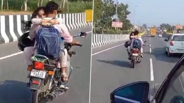 Couple Romance on Bike: यूपी के हापुड़ में कपल ने चलती बाइक पर रोमांस करते आए नजर, वीडियो वायरल होने पर पुलिस ने ठोका 8 हजार का चालान