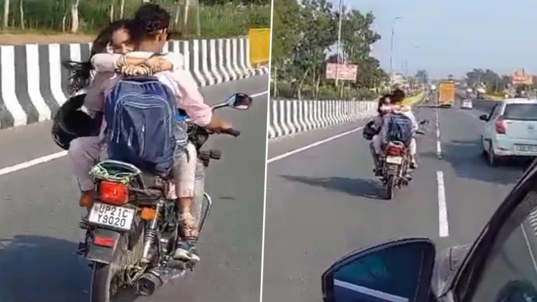Couple Romance on Bike: यूपी के हापुड़ में कपल ने चलती बाइक पर रोमांस करते आए नजर, वीडियो वायरल होने पर पुलिस ने ठोका 8 हजार का चालान