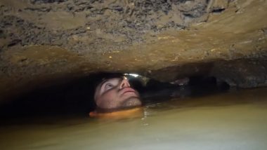 Man Almost Drowns While Exploring Cave: गुफा की तलाश करते वक्त वक्त डूबते-डूबते बचा शख्स, कैमरे में कैद हुआ डरावना पल