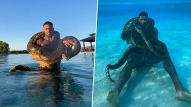 Man With Giant Anaconda Inside Pool: पूल के अंदर विशाल एनाकोंडा के साथ दिखा शख्स, इंटरनेट पर शॉकिंग वीडियो वायरल