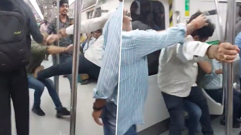 Delhi Metro Fight Video: दिल्ली मेट्रो में यात्रियों के बीच झड़प के दौरान लात-घूंसे चले, वीडियो वायरल
