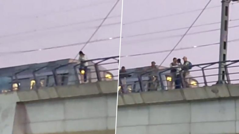 Delhi Metro Suicide Attempt Video: महिला ने शादीपुर मेट्रो ट्रैक से कूदने की दी धमकी दी, सुरक्षा कर्मियों ने बचाया