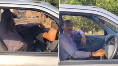 Man Driving Car From Passenger Seat: पैसेंजर सीट से कार चलाते व्यक्ति का क्लिप वायरल, वीडियो देख आपके रोंगटे खड़े हो जाएंगे