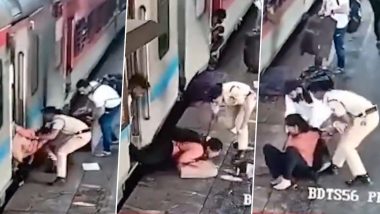 Brave Act! चलती ट्रेन में चढ़ने के दौरान फिसल कर गिरी महिला को आरपीएफ अधिकारी ने बचाया (देखें वीडियो)