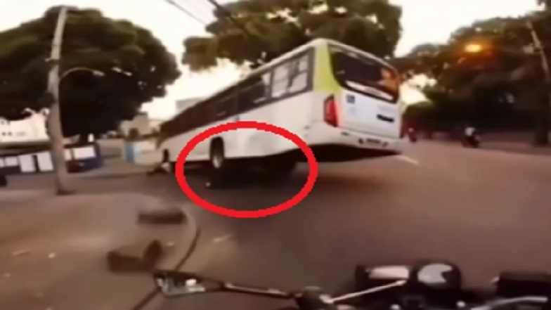 Accident Video: ओवरटेक के चक्कर में भयानक हादसा, बस के नीचे आया बाइक सवार, दिल दहला देगा वीडियो