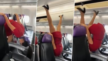 Flight Cabin Crew Viral Video: विमान में सिर के बल खड़े होकर एयर होस्टेस ने किया गजब का कारनामा, वीडियो देखकर आप भी हो जाएंगे दंग