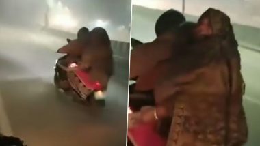 Viral Video: चलती बाइक पर ठंड से बचने के लिए महिला ने लगाया गजब का जुगाड़, वीडियो देखकर हो जाएंगे हैरान