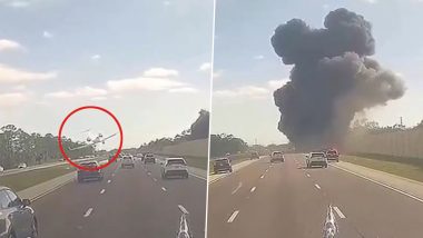 Plane Crash on Highway Video: जमीन पर 2 कार और विमान के बीच भीषड़ टक्कर, 2 पायलट की मौत; ड्राइवर घायल