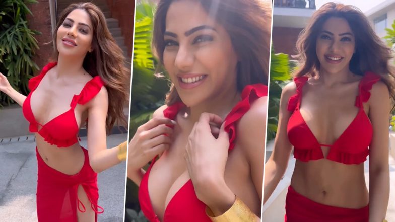 Nikki Tamboli ने रेड आउटफिट में गिराई बिजली, मॉडल की दिलकश अदाओं ने जीता फैंस का दिल (Watch Video)