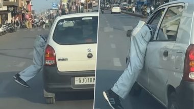 Video- Car Driver Drags Man Into Car: पार्किंग चार्ज मांगने पर कार ड्राईवर ने अटेंडेंट को लटका कर सड़क पर 100 मीटर तक घसीटा, देखें वीडियो