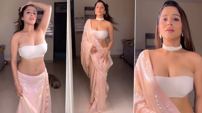 Kate Shrama ने सिजलिंग साड़ी पहन दिए सेक्सी पोज, एक्ट्रेस की हॉटनेस ने बढ़ाया सोशल मीडिया का तापमन (Watch Video)