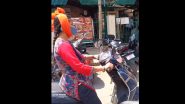 Viral Video: स्कूटी चलाते समय फोन पर बात करने का ये कैसा जुगाड़? महिला के कारनामे को देख उड़ जाएंगे आपके होश