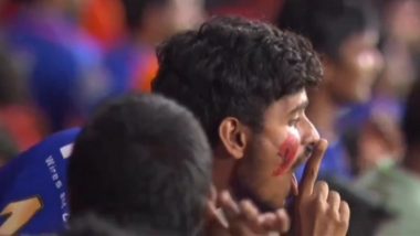 RCB Fan Performs ‘Silence' Gesture: रॉयल चैलेंजर्स बेंगलुरु के फैन ने सनराइजर्स हैदराबाद के समर्थकों पर 'मौन' किया इशारा, वीडियो हुआ वायरल