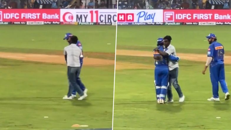 Fan Invade Pitch: वानखेड़े स्टेडियम में सिक्यूरिटी घेरा तोड़ रोहित शर्मा से मिलने ग्राउंड में पहुंचा जबरा फैन, ईशान किशन को भी लगाया गले, देखें वीडियो