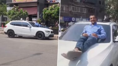 VIDEO: मुंबई से सटे कल्याण में 17 वर्षीय नाबालिग चला रहा था BMW, बोनट पर लेटकर स्टंट करने वाले शख्त को पुलिस ने किया गिरफ्तार