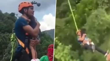 Viral Video: शख्स ने खतरे में डाली बच्चे की जान, बिना किसी सेफ्टी के उसे गोद में लेकर हजारों फीट की ऊंचाई से कूदा