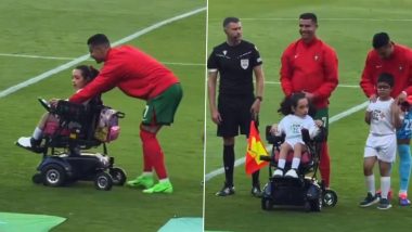 Cristiano Ronaldo Assists Little Girl: पुर्तगाल बनाम आयरलैंड मैच से पहले क्रिस्टियानो रोनाल्डो ने व्हीलचेयर पर बैठी छोटी बच्ची की मदद की, वीडियो हुआ वायरल