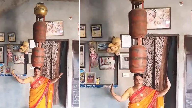 Aunty Dance Video Viral: दो सिलेंडर सिर पर रखकर आंटी ने किया ऐसा डांस, देखकर लोगों ने दांतों तले दबा ली उंगलिया, सोशल मीडिया पर जमकर वायरल हो रहा है वीडियो