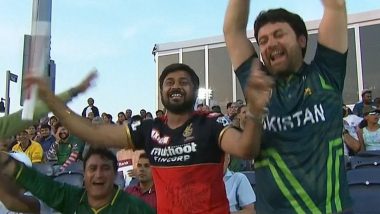 RCB Fan Spotted At USA vs CAN Match: टी20 विश्व कप में यूएसए बनाम कनाडा मैच के दौरान स्टैंड में आरसीबी के जर्सी में दिखा फैन, देखें तस्वीर