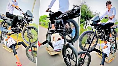 Bike Video: ऐसी अजीब बाइक आपने कहीं नहीं देखी होगी, बाइक के नीचे चार पहिएं, बाइक चलाते हुए शान से जा रहा लड़का, वीडियो देखकर लोग हुए हैरान