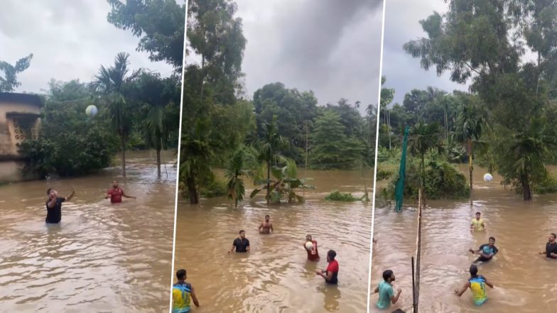 Video: कमर तक भरा है बारिश का पानी, फिर भी खेल रहे है वॉलीबॉल, लड़कों का वीडियो हुआ वायरल