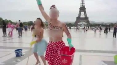 Semi-Nude Anti-Fascist Protest in Paris: एफिल टॉवर के सामने महिलाओं ने टॉपलेस होकर किया प्रोटेस्ट, फासीवाद के खिलाफ लगाए नारे- VIDEO