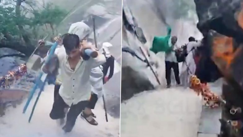 Gujarat Rains Video: खतरे के बीच अटूट श्रद्धा! मूसलाधार बारिश में गिरनार पर्वत पर पालकी उठाए पहाड़ की सीढ़ियां चढ़ते रहे भक्त