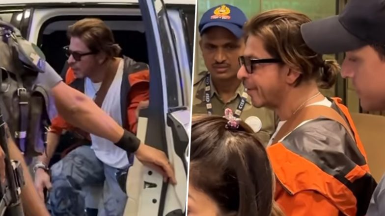 Shah Rukh Khan Don Look: शाहरुख खान ऑरेंज हुडी में एयरपोर्ट पर हुए स्पॉट, डॉन लुक में जीता फैंस का दिल (Watch Video)