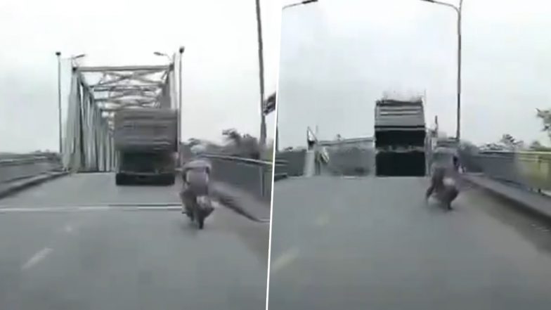 Typhoon Yagi in Vietnam: भारी बारिश के बाद फ़ू थो प्रांत में स्टील ब्रिज ढहने से नदी में गिरा ट्रक, भयावह क्लिप वायरल