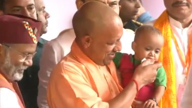 CM Yogi Feeds Chocolate to Child: उत्तर प्रदेश के सीएम योगी आदित्यनाथ ने बहराइच में बच्चे को खिलाई चॉकलेट, दिल को छू लेने वाला वीडियो हुई वायरल