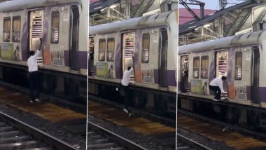 Mumbai Local Train Video: सीट के लिए जान जोखिम में डाली, ट्रेन की पटरियों पर उतरा शख्स, लोकल में चढ़ने का वायरल हुआ वीडियो