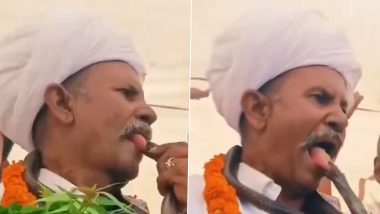 Viral Video: अपनी जीभ को सांप से कटवाया! बुजुर्ग शख्स के खतरनाक स्टंट को देख लोग हुए हैरान