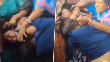 Women Fight Video: महिलाओं का सड़क पर एक दूसरे के बाल खिंचने और गालियां देने का वीडियो वायरल