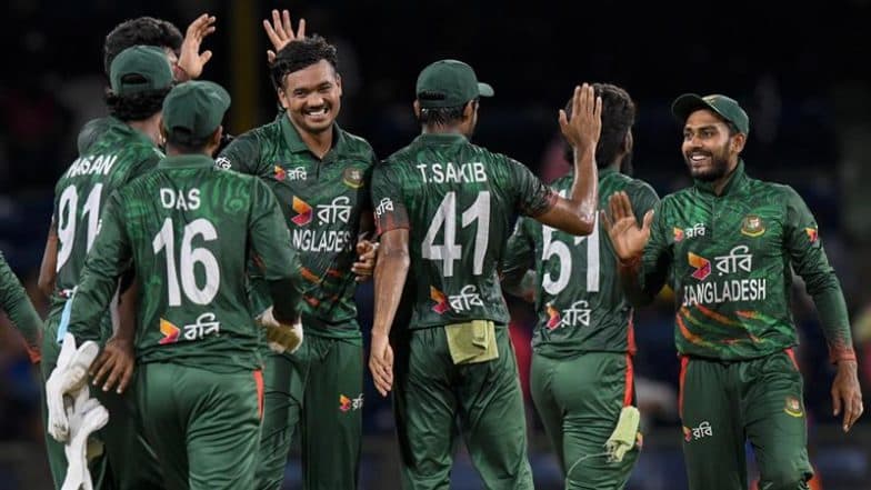 UAE vs BAN, 1st T20I Match Scorecard: रोमांचक मुकाबले में बांग्लादेश ने संयुक्त अरब अमीरात को 27 रनों से रौंदा, हसन महमूद ने चटकाए 3 विकेट, सीरीज में बनाई 1-0 की बढ़त; यहां देखें UAE बनाम BAN मैच का स्कोरकार्ड UAE vs BAN, 1st T20I Match Scorecard: रोमांचक मुकाबले में बांग्लादेश ने संयुक्त अरब अमीरात को 27 रनों से रौंदा, हसन महमूद ने चटकाए 3 विकेट, सीरीज में बनाई 1-0 की बढ़त; यहां देखें UAE बनाम BAN मैच का स्कोरकार्ड
