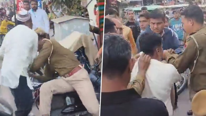VIDEO: राजस्थान के टोंक में पुलिस और शख्स के बीच हुई सड़क पर हाथापाई, धक्का मारकर गिराया नीचे, वीडियो वायरल