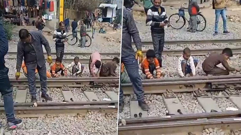 Lucknow Shocker: रेलवे क्रॉसिंग पर बच्चों से काम कराए जाने का वीडियो वायरल, रेलवे ने दी अजीबोगरीब सफाई; VIDEO