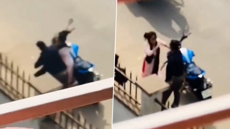 Couple Fight Video: जोड़े ने सड़क के बीच में एक दूसरे को जमकर पीटा, उसके बाद एक साथ स्कूटर पर चले गए- देखें वायरल वीडियो