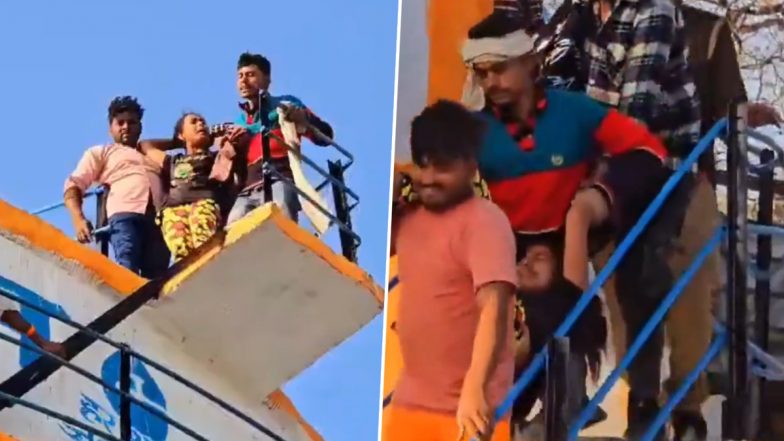 Budaun: परिवार द्वारा प्रेमी से शादी से न कराने पर युवती पानी की टंकी पर चढ़ी, हाई-वोल्टेज ड्रामा के बाद नीचे उतारी गई (देखें वीडियो)
