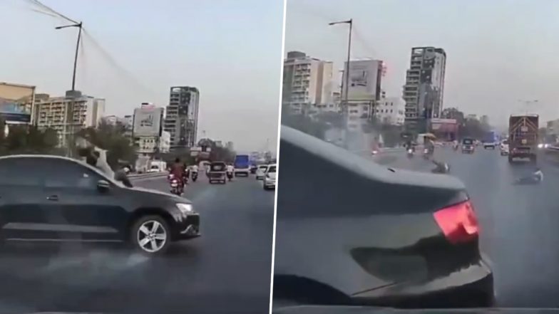 Pune Road Accident: पुणे के वाकड में तेज रफ़्तार कार का कहर, बाइक सवार को मारी टक्कर, बीच सड़क गिरे दो लोग घायल (Watch Video)
