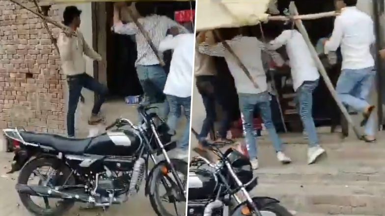Bulandshahr Shocker: दबंगों का आतंक! उधारी देने से मना करने पर 4 युवकों ने दूकान में घुसकर की मारपीट, हाथों में डंडे लेकर दुकानदार के परिवार को किया घायल, बुलंदशहर के ककोड़ की घटना (Watch Video)